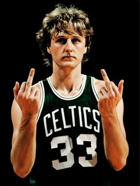 an image of a basketball player holding his hands up